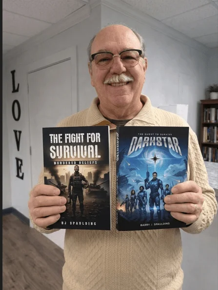 Barry Spaulding author portrait holding his military sci-fi books